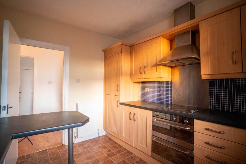 Kitchen, Coatbridge — before refurbishment